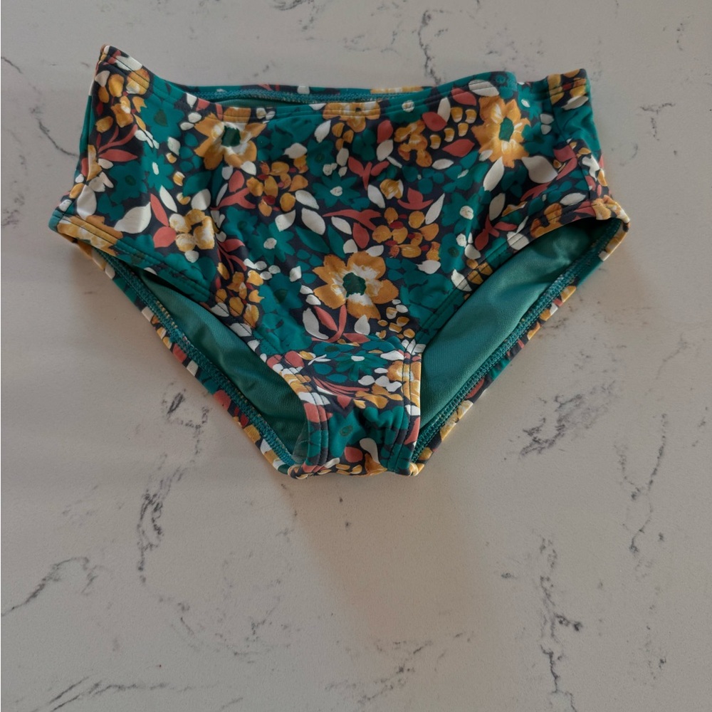 Oneill Girls “Lani” Ditsy Ruffle Swim bottom in turquoise -Size 8